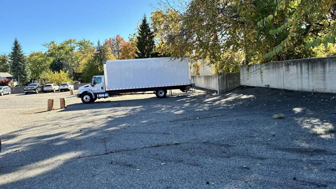 Commercial lot cleared of leaves