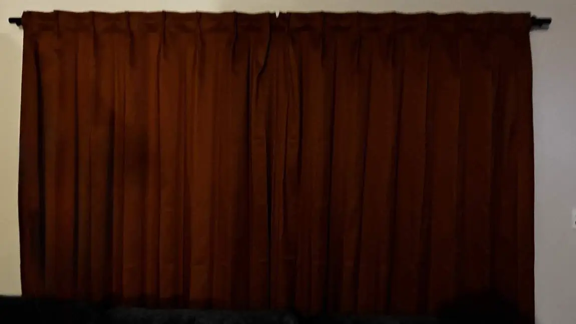 New curtains hung on a rod